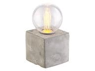 Pallomainen pöytävalaisin LEDillä ja betonialustalla