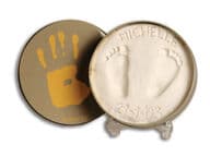 Muksun kädenjälki savimallisetti